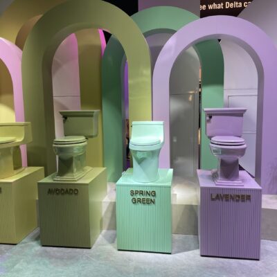 Display of colorful toilets at the 2023 NRF Big Show.