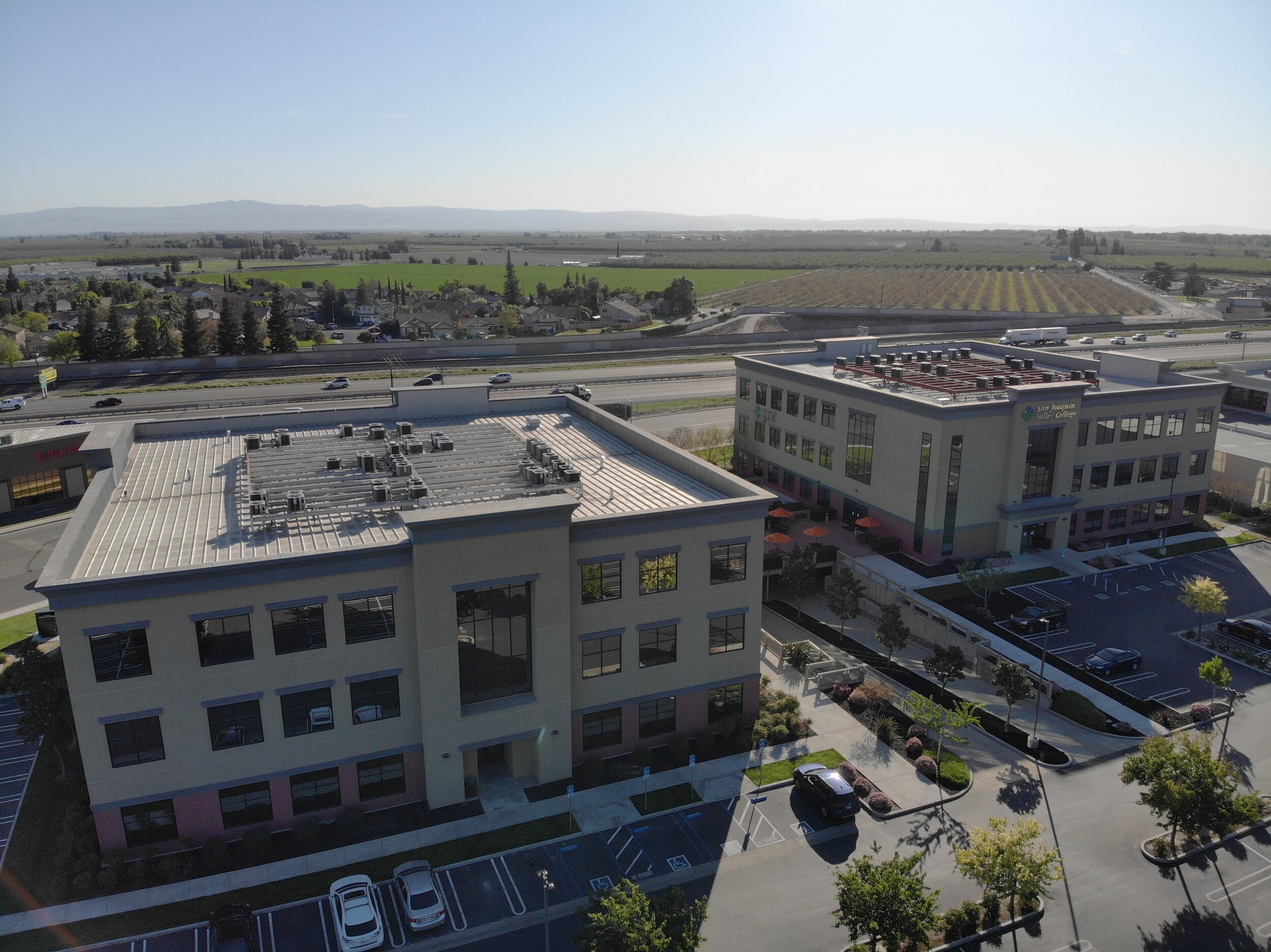 Exterior of two large office buildings.