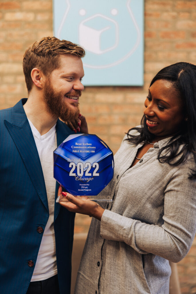 Bob Spoerl and DeAnna Spoerl holding "Best of 2022" award.