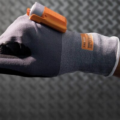 Person modeling glove with hi-tech device attached.