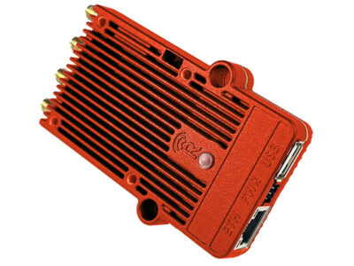 Red device with ports labeled for ethernet, power, and USB.