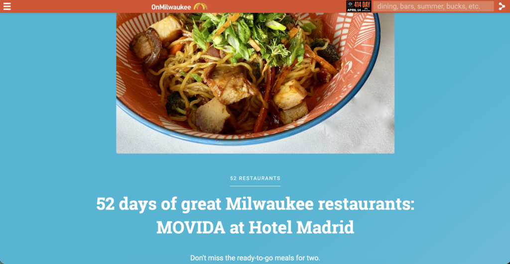 A colorful bowl of noodles topped with tofu, vegetables, and herbs sits above a headline promoting 52 days of great Milwaukee restaurants, featuring MOVIDA at Hotel Madrid.