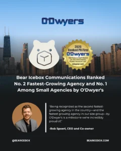 A graphic announces Bear Icebox Communications’ ranking by O’Dwyer’s as the No. 2 fastest-growing agency and No. 1 among small agencies. It features a bear logo, a city skyline, a quote from CEO Bob Spoerl, and his photo.